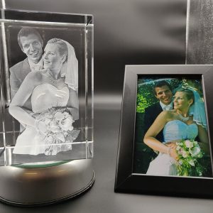 bride and groom photo engraved inside a big crystal